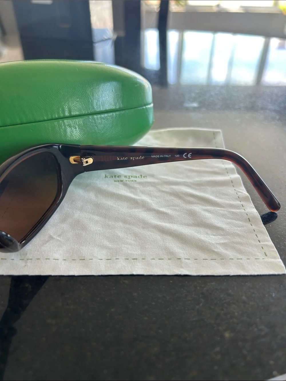 Kate Spade prescription sunglasses with sunglasses case and cleaning cloth